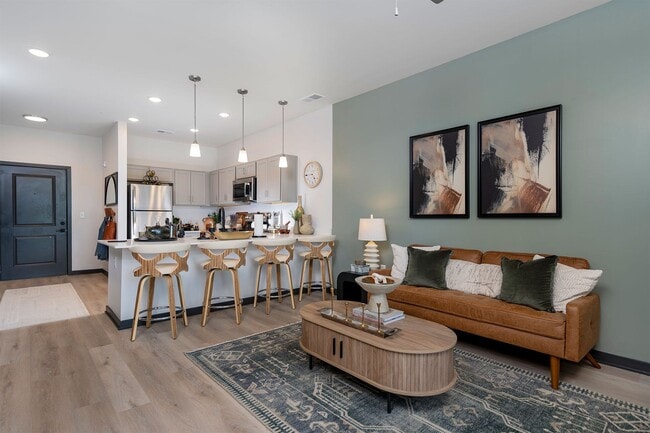 1BR, 1BA - 741SF - Kitchen and Living - The Flats of River Ridge
