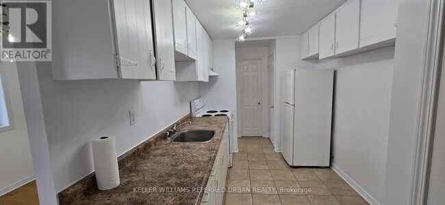 Photo - 303 Frontenac Ave Unité 1