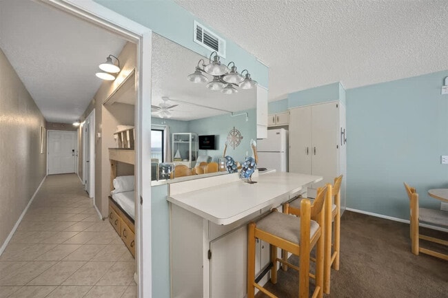 Photo - 8743 Thomas Dr Unit SI FL6-ID1355011P