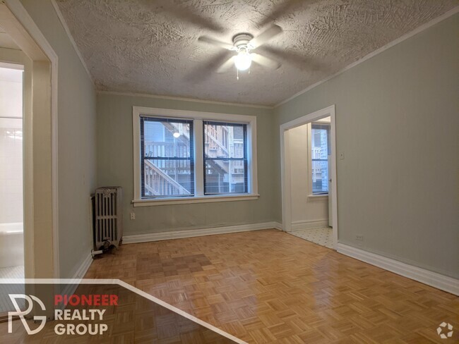 Building Photo - 717 W Belmont Ave Unit 110 Rental