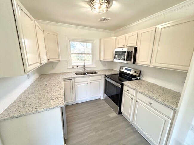 Photo - Coming Soon-2/5/26!- Charming 3- bedroom home with a move in special!