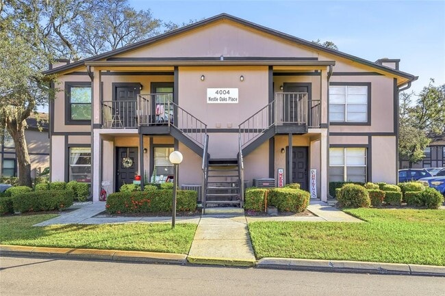 Building Photo - 4004 Nestle Oaks Pl Unit 203