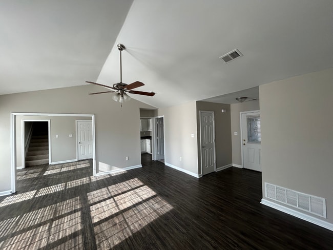 Photo - Spacious 4BR/2BA Olive Branch Home | 1,965 Sq Ft, Modern Fireplace, Bay Window & 2-Car Garage