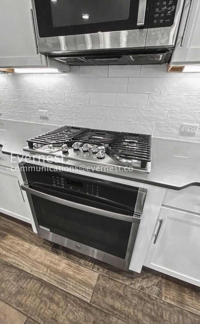 Photo - 3 Bed, 2 Bath Home with Fenced Yard & Garage / Pet-Friendly / Available Now!