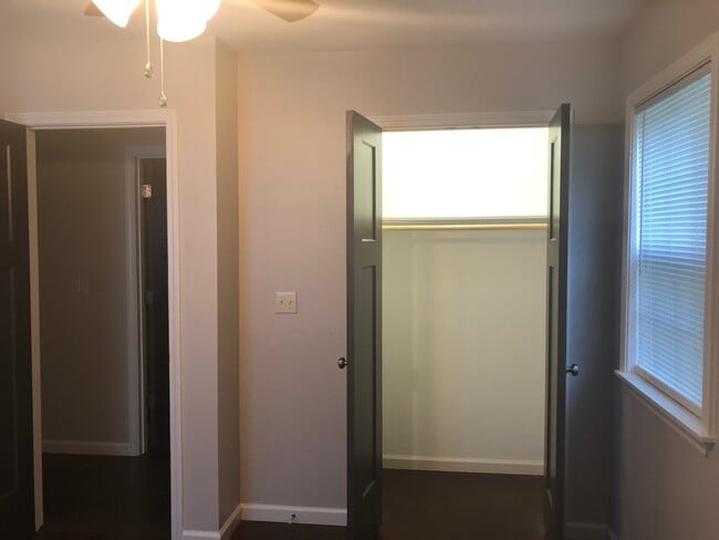 Bedroom #2 looking at closet & hallway to master bedroom