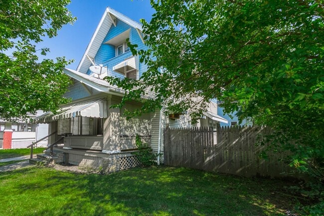Photo - Charming 3BR Home with Classic Woodwork, Porch & Bonus Attic Space