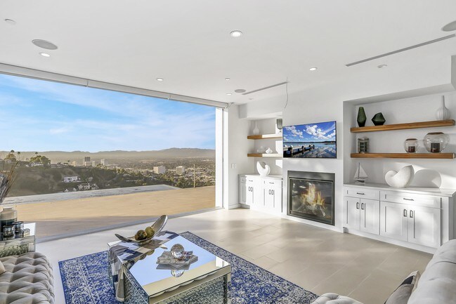 Built in fireplace, shelves and TV - 3865 Beverly Ridge Dr