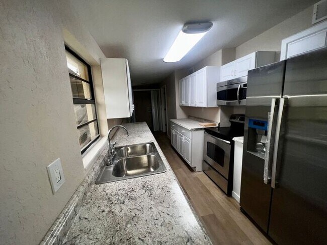 Photo - Remodeled 4 Bedroom 2 Bath Home Minutes from Sanford international Airport!