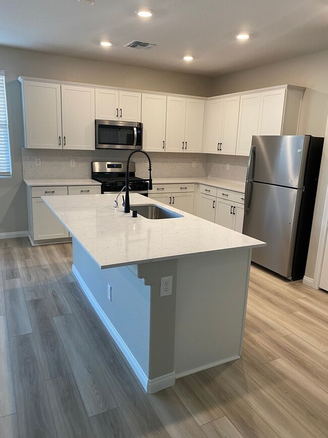 Photo - Americana Property Mgmt - 2022 built 4 bedrooms in prime South West Las Vegas