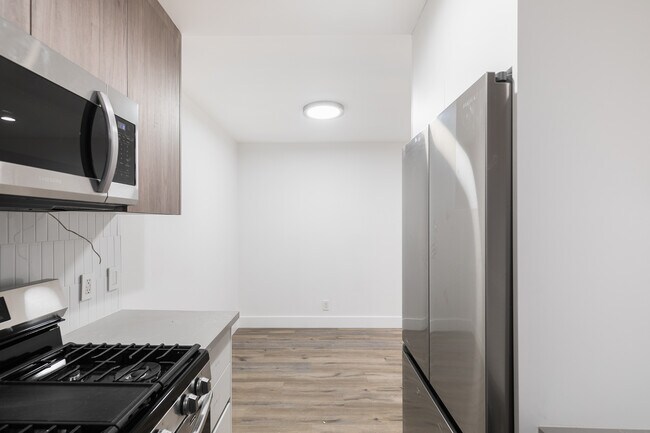 Photo - Experience Modern Living: Newly Renovated ...