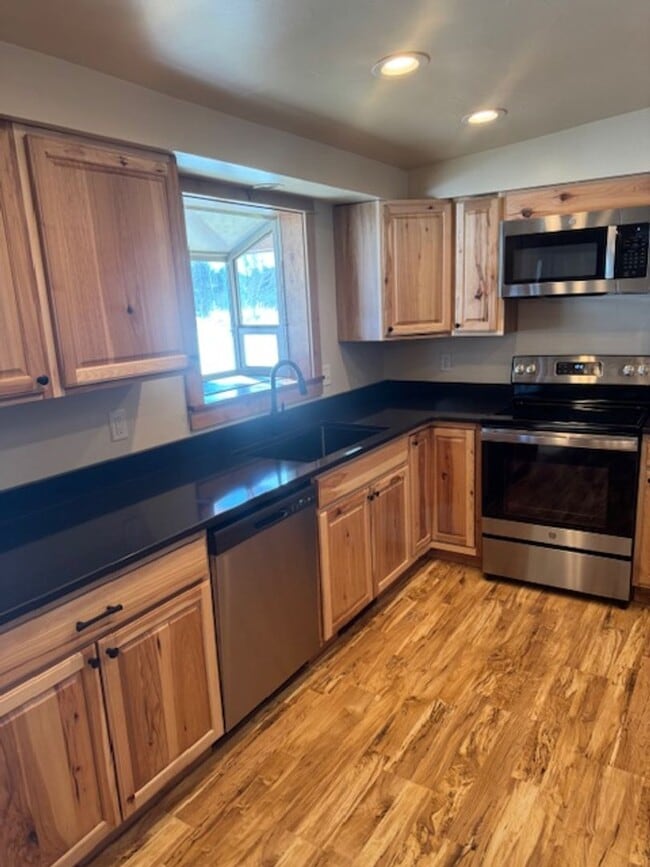 Photo - Beautifully upgraded 3 BR 2Ba with W/D and Shop/Garage in back.