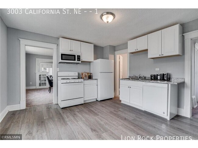 Building Photo - Pet Friendly! Modern Comfort in a Historic... Unit 1 Rental