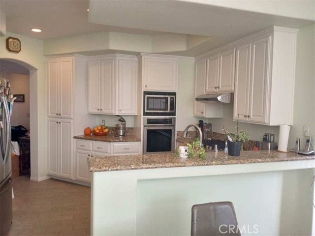 Photo - 5142 Warner Ave Unit 205