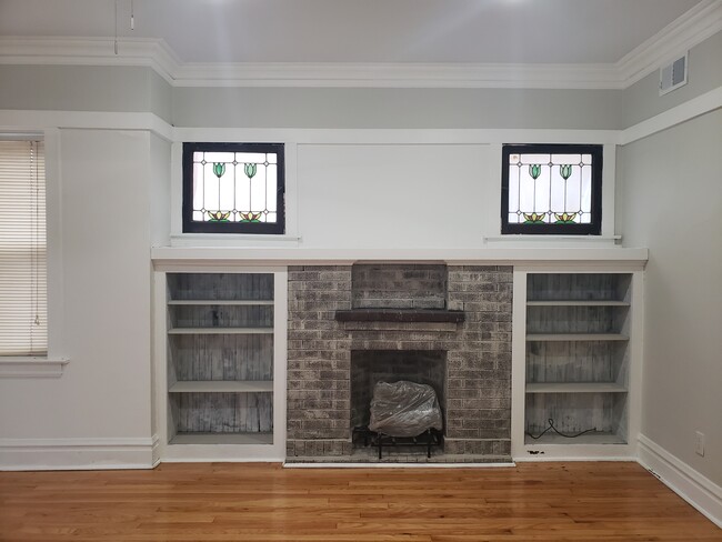 Living room- build in fireplace - 3811 N Central Park Ave Apartments Unit 2