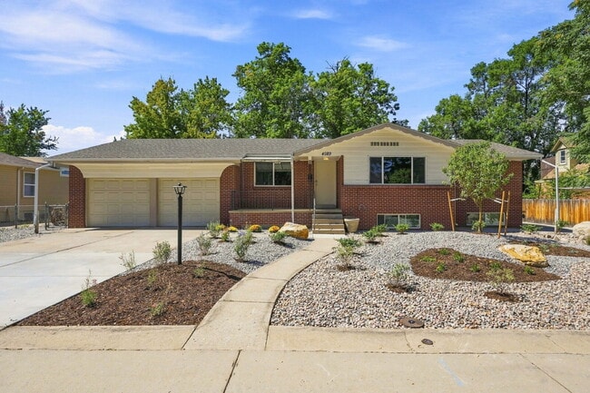 Building Photo - AVAILABLE NOW
Spacious 4-Bedroom Wheat Ridge Home with Finished Garden Level, Two-Car Garage & B...