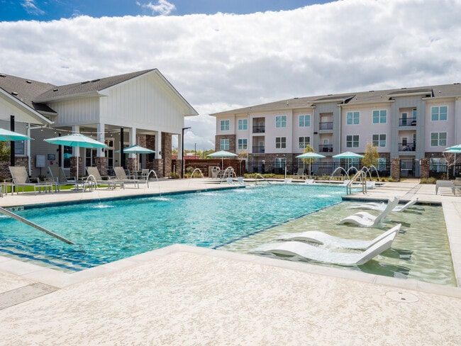 Resort-Style Pool with Baja Tanning Shelf - The Waters At Millerville