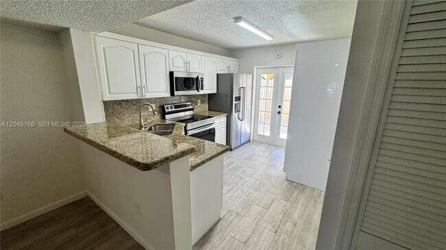 Photo - 7439 W 22nd Ave Unit 103