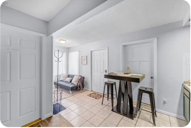 Photo - Furnished 1-Bedroom Apartment with Private Entrance and Free Laundry Unit 5