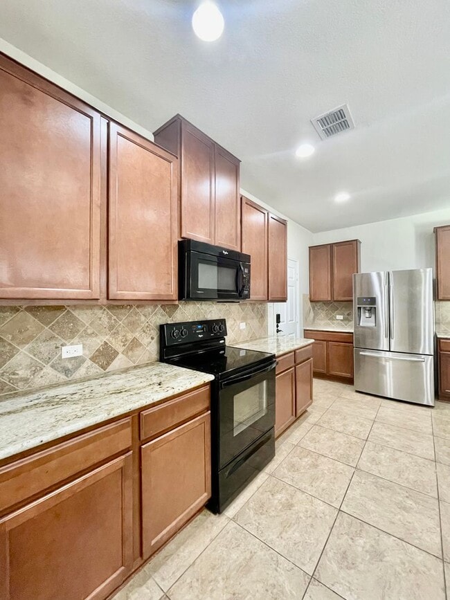 Photo - Spacious 4 Bedroom Home with Multiple Livi...