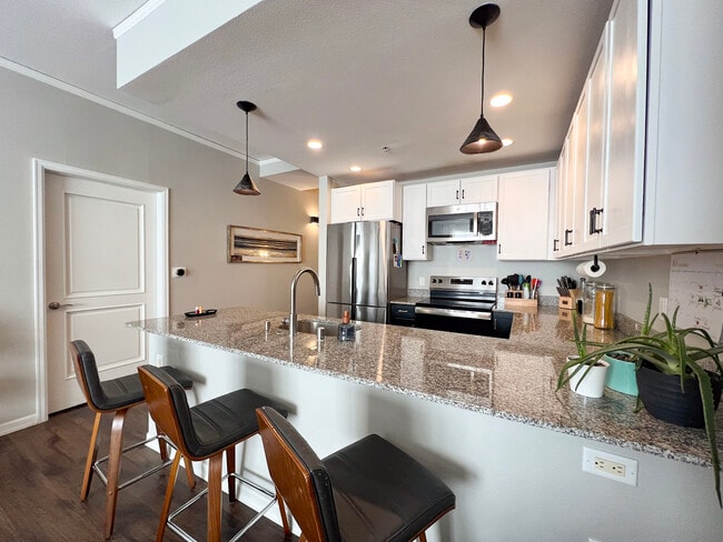 Building Photo - 1975 N Grant St Unit 217