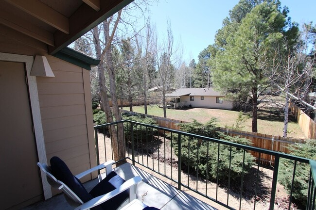 Photo - Fully Furnished 2BR Condo | Private Balcony + Covered Parking