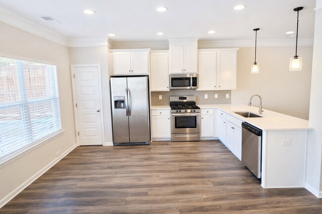 Photo - 3-bedroom Townhome in Buford City Schools with Quartz Kitchen, Private Suite, and Walkable Downto...