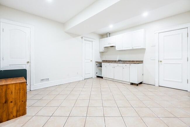 Photo - Bright, Beatutiful & Look Out Basement Apt.
