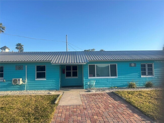 Building Photo - 13406 Boca Ciega Ave Unit 4