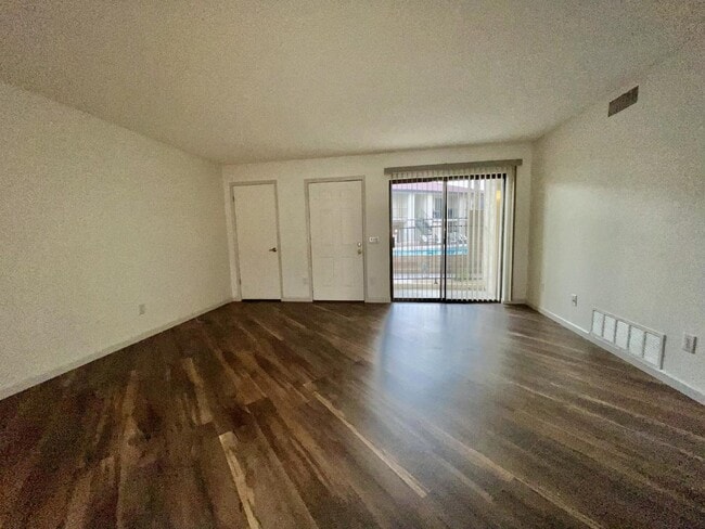 Photo - Gated community with a pool, 2 bed 1 bath $975 rent. Unit A7