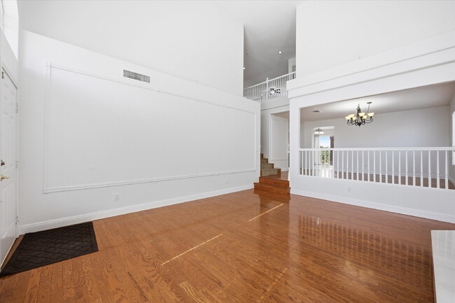 Photo - Exquisite 5-bed, 3-bath home w/ spacious 3-car garage offers luxurious living & effortless entert...