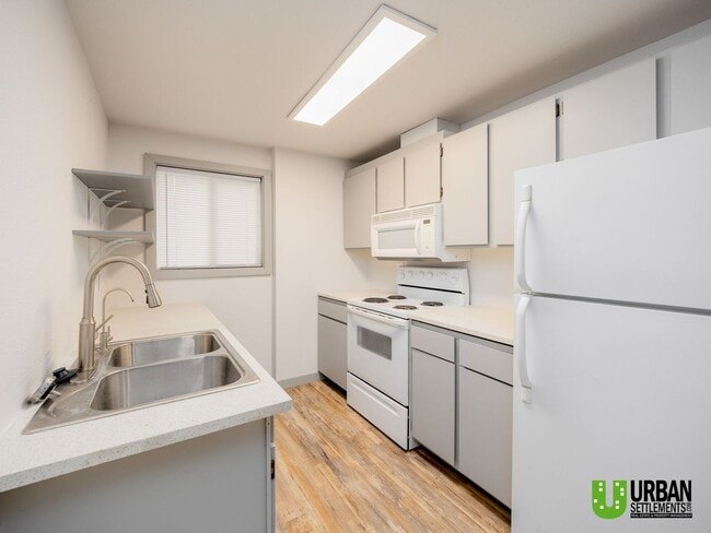 Photo - Charming 2-Bedroom Downstairs Condo with Community Pool