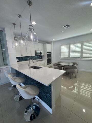 Photo - 613 Windward Cir N