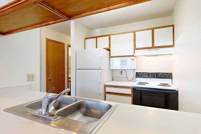 Whip up your favorite meals in our Bonsai studio, featuring a galley kitchen that keeps everything within reach.