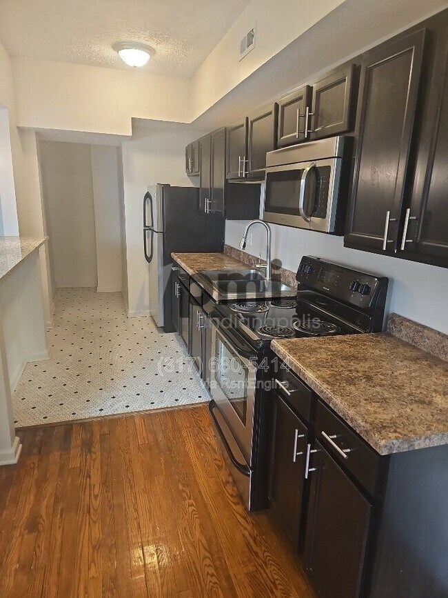 Photo - 1 W 28th St Unidad 108