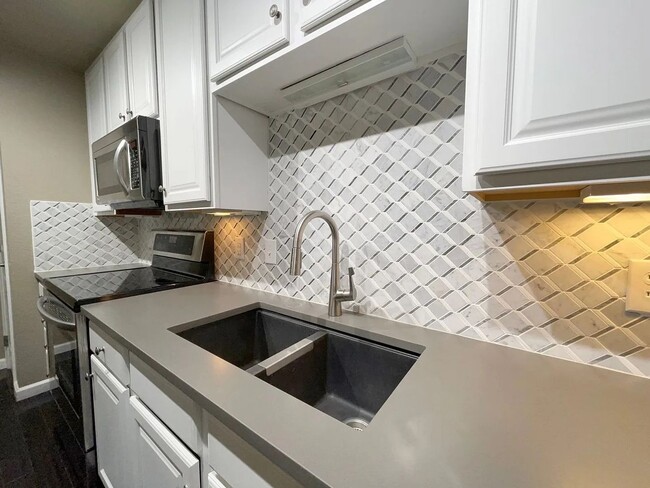Photo - Spacious 2 Bed, 2 Bath + Office Townhome with Attached Garage | Broadlands Community Unit H
