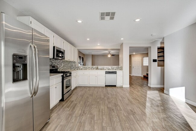 Photo - Totally Updated Solar Powered 4 Bedroom! Bedroom and Bath Downstairs!