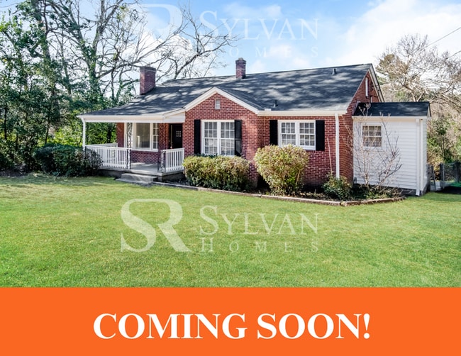 Building Photo - The living is easy in this 3 bedroom, 2 bathroom brick home