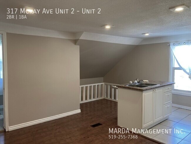 Photo - CHARMING 2-BEDROOM/1BATH BETWEEN WEST AND DOWNTOWN CAMPUSES + HYDRO Unit 2