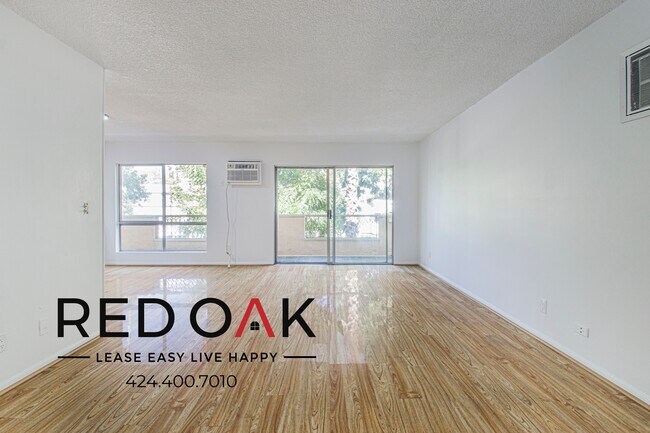 Building Photo - 7720 Hampton Ave Unit 212