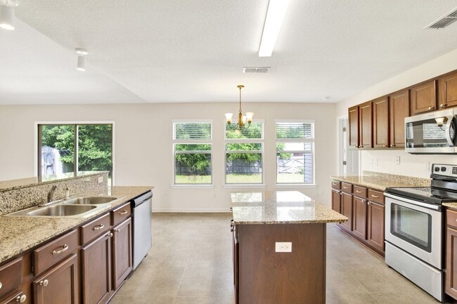 Photo - Charming 4-Bedroom Home with Spacious Yard