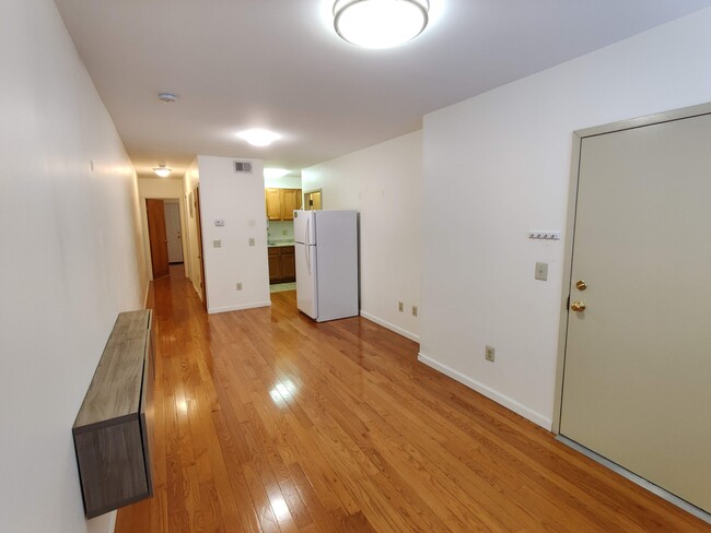 Living Room view Corner - 1229 Wood St Apartments Unit 1