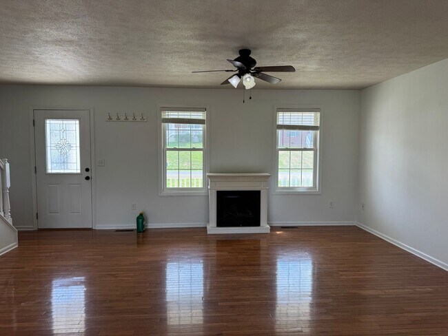 Photo - 2 story home with 1 car garage and fenced yard