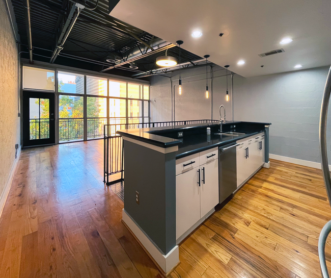 Kitchen Overlooking Living Room and Balcony - 33 Ponce de Leon Ave NE Condo Unit 301