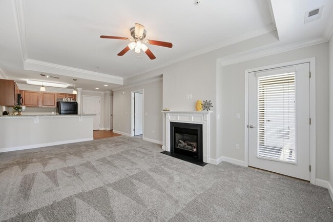 The Promenade Apartments - Living Room with View to Kitchen