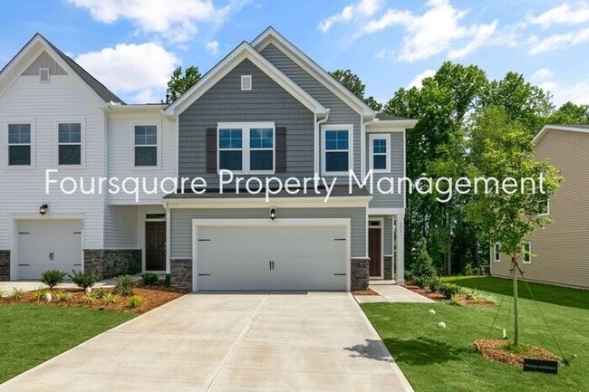 Building Photo - Spacious End-Unit Townhome with 2nd Floor Loft, Screened-In Porch & 2-Car Garage , High-Speed Int...