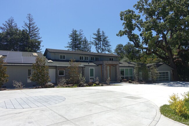 Photo - Spectacular excecutive home, sleek modern remodel, peaceful grounds, with massive pool. Easy acce...