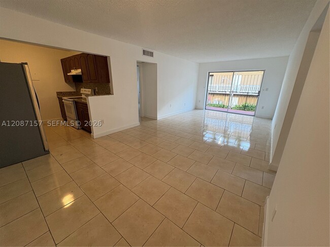 Building Photo - 633 S Royal Poinciana Blvd Unit B218