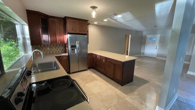 Kitchen with open floor plan - 1649 Hull Cir Rental