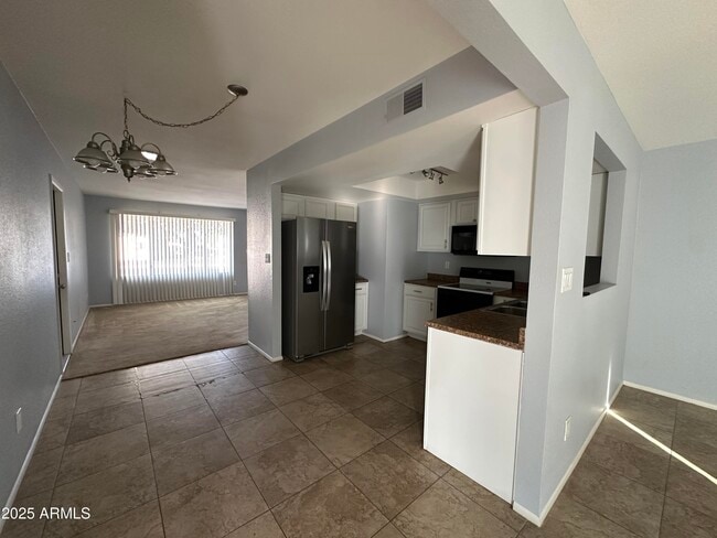 Photo - 10421 W Puget Ave