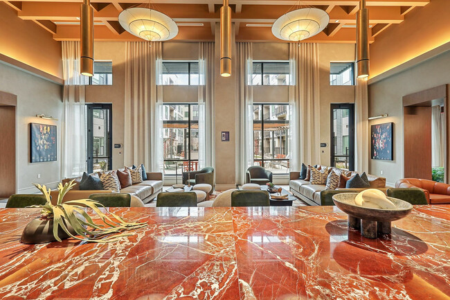 Relax, connect, and unwind in the inviting resident lounge - The Devon Apartments